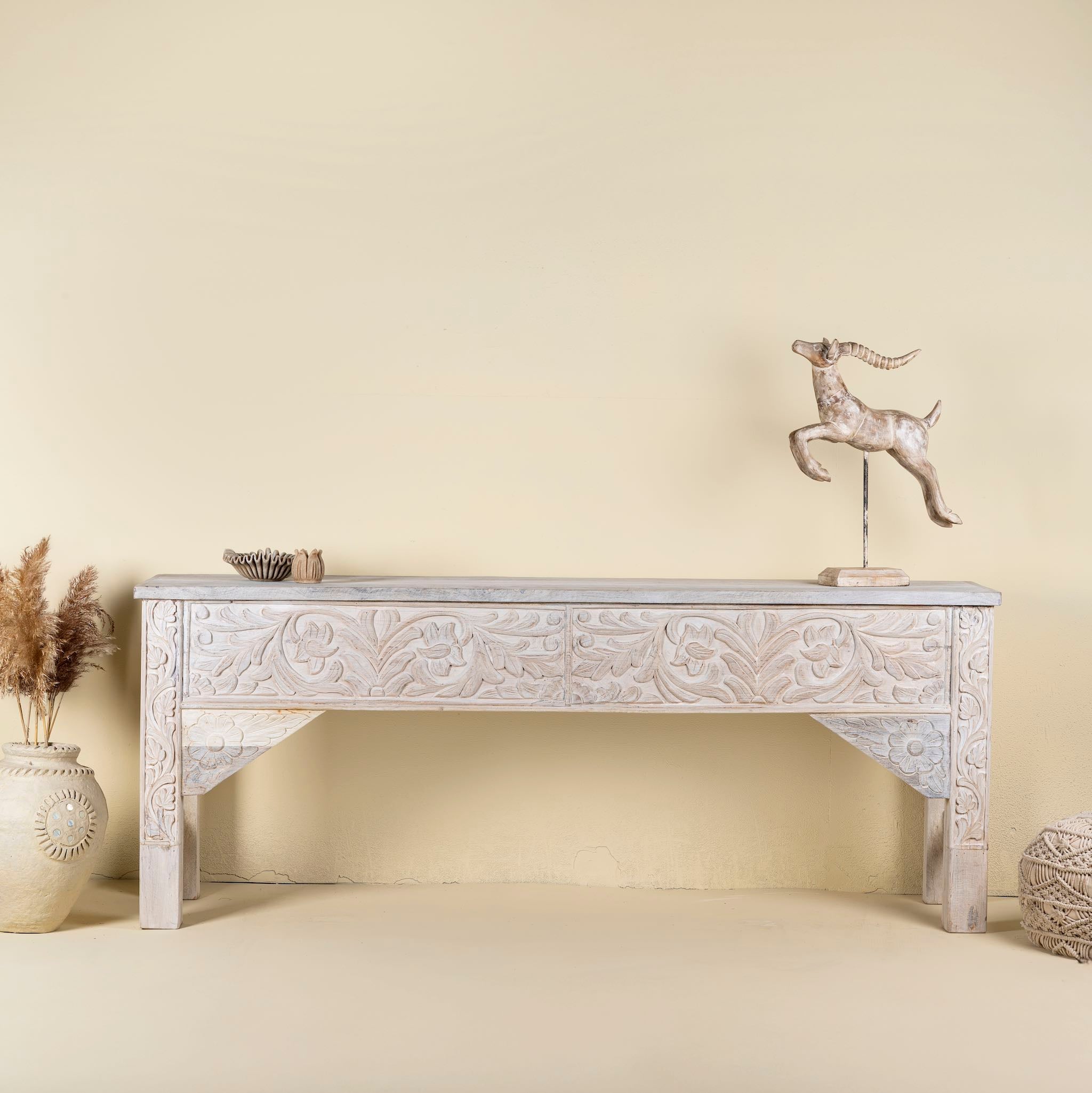 Hand-carved whitewashed reclaimed wood console table with floral details; vintage home decor with rustic and bohemian charm, 196 × 44 × 80 cm.