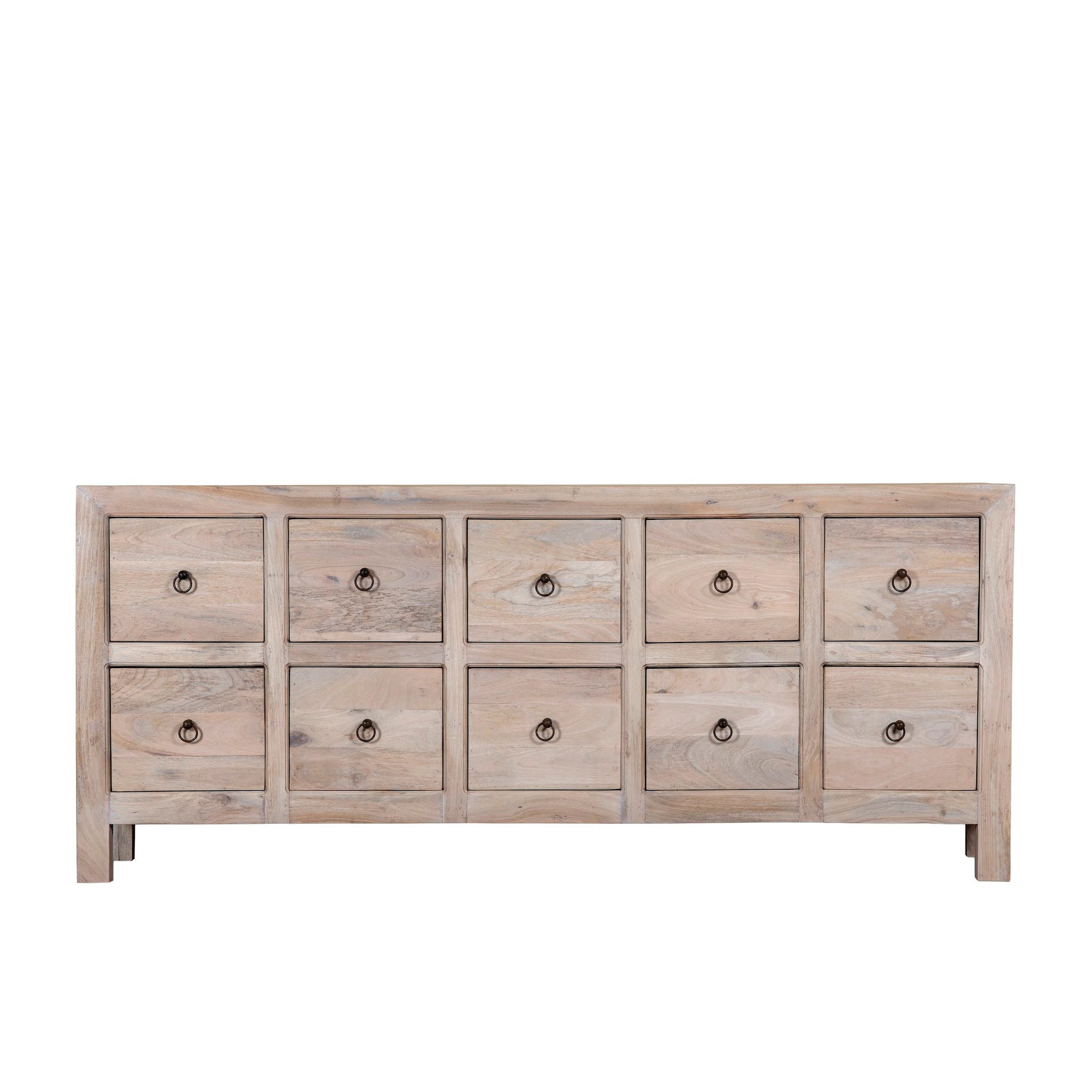 White background image of a sandblasted reclaimed mango wood chest of drawers with ten drawers, perfect as bedroom furniture or part of a relaxed Ibiza-style interior.