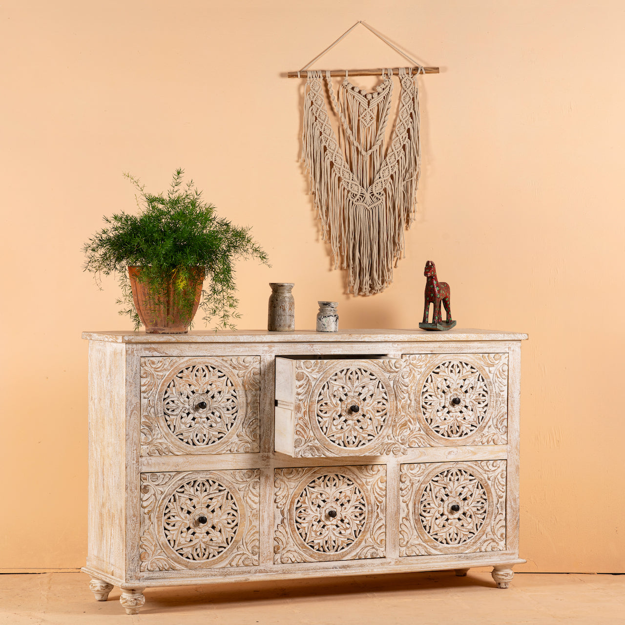 Open drawer image of a hand-carved mango wood sideboard with Mediterranean drawer motifs and whitewashed finish; ideal carved sideboard or entryway table vintage, 150 × 90 × 40 cm.