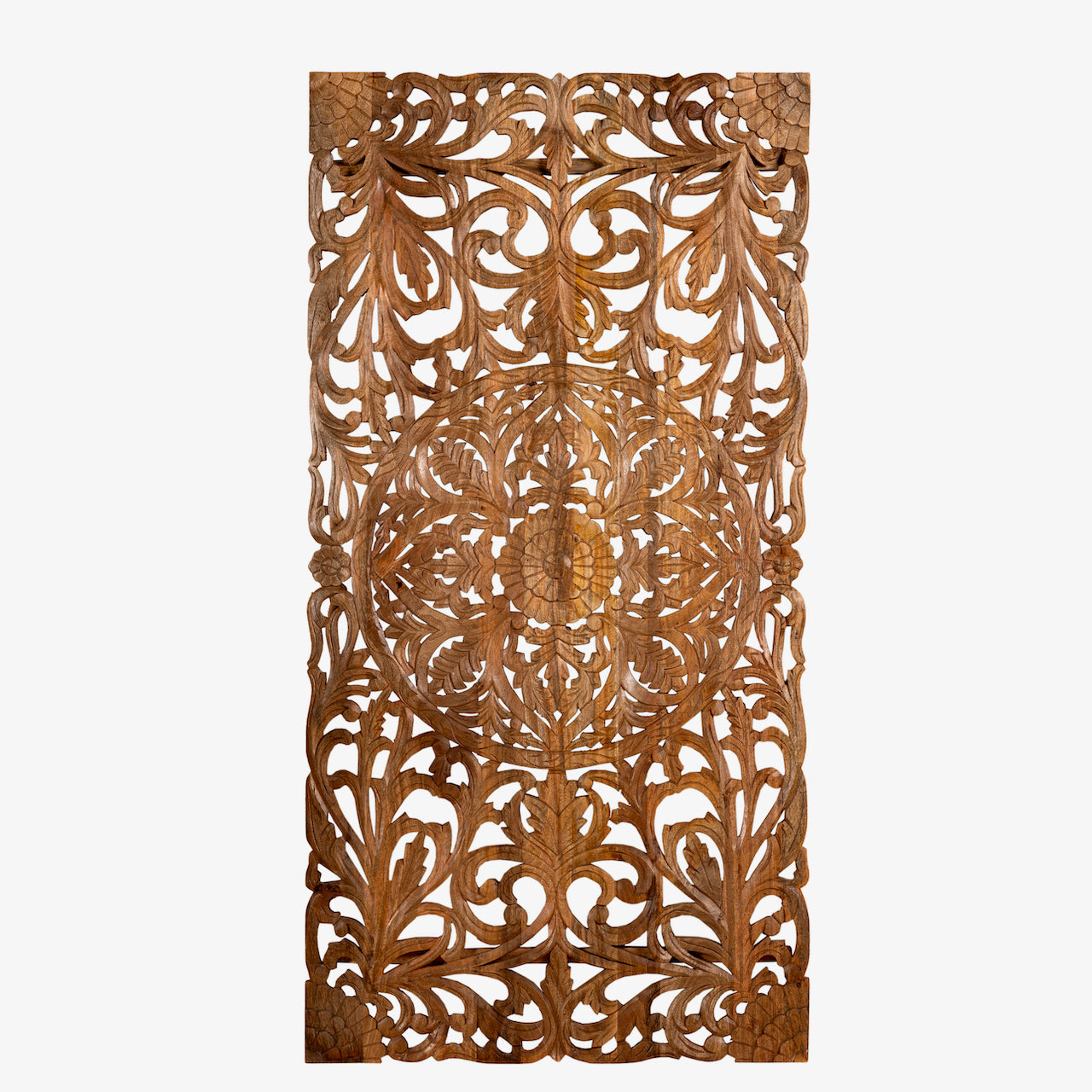White background image of a hand-carved mango wood wall panel with intricate floral design and natural finish – Aruna model by Om Home & Garden