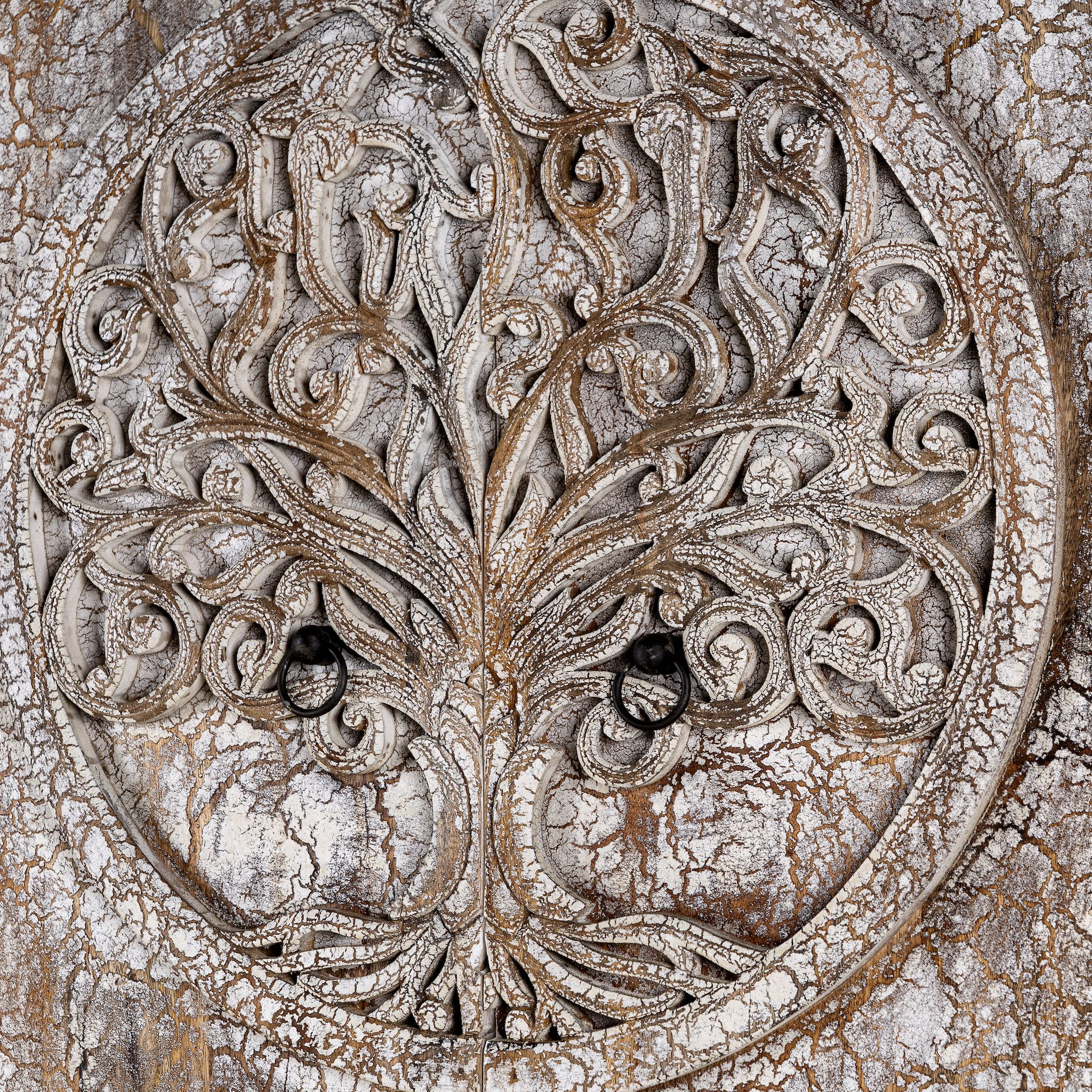 Close up image of a vintage style wardrobe with Tree of Life design, hand-carved mango wood furniture with four storage compartments, 90 × 40 × 180 cm.