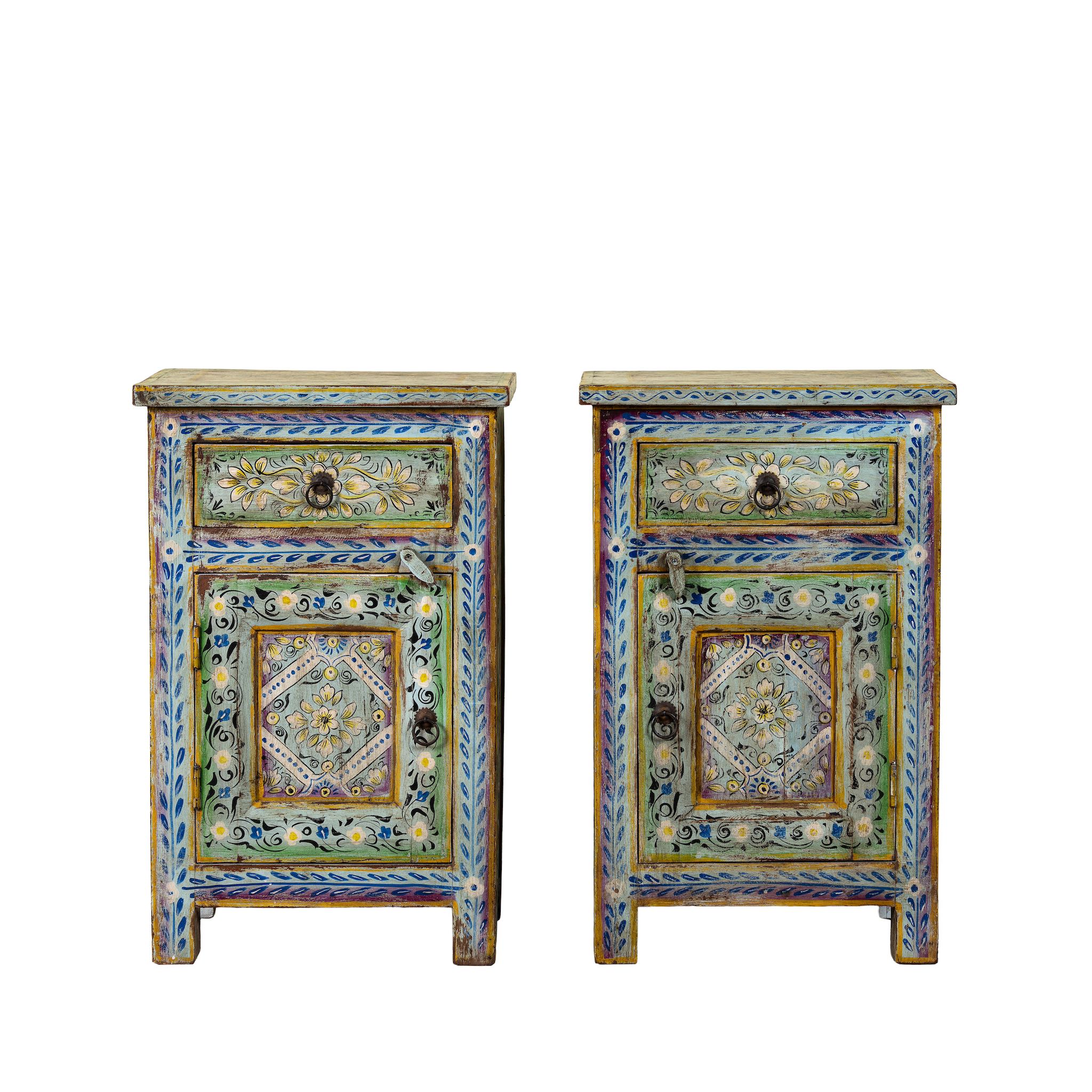 White background image of a pair of hand-painted nightstands made of reclaimed wood in boho style, sustainable furniture with drawer and cabinet, 45 × 35 × 70 cm.