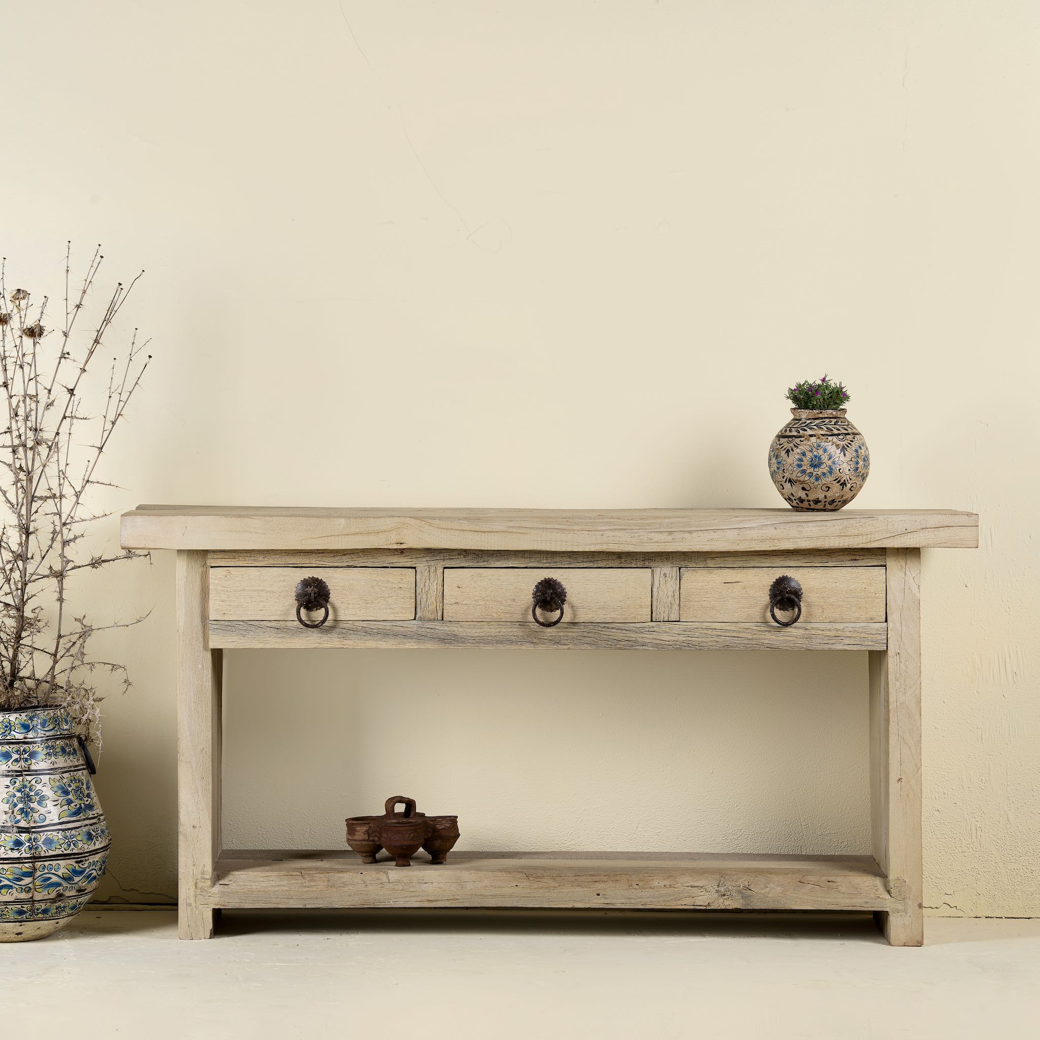 Teak wood console table with sandblasted finish, three drawers and lower shelf; sustainable furniture for entryways, living rooms, or bathrooms, 160 × 30 × 80 cm.