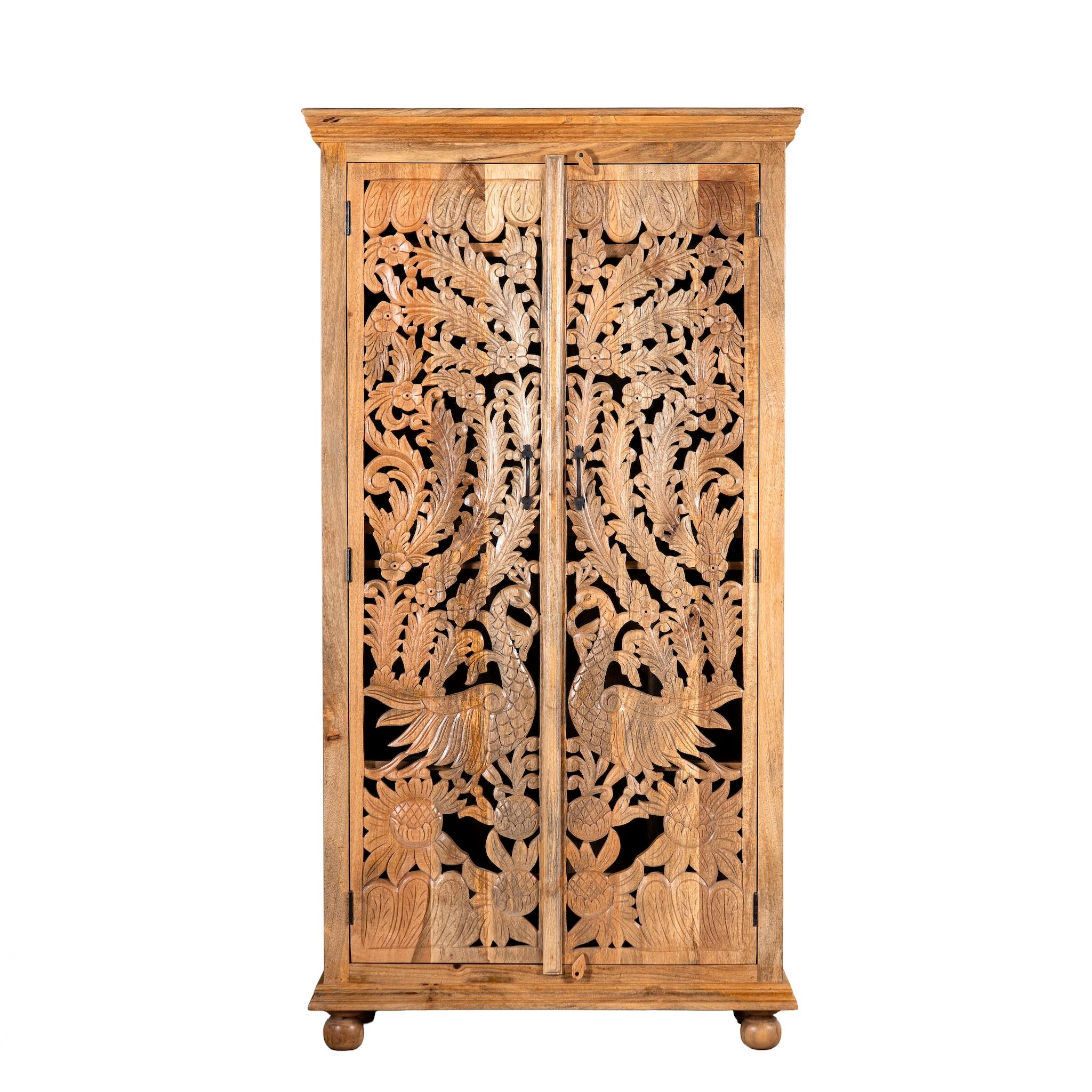 White background image of a hand-carved mango wood cupboard with Indian peacock design motifs, Mediterranean-style wardrobe; elegant mango wood furniture, 190 × 100 × 40 cm.