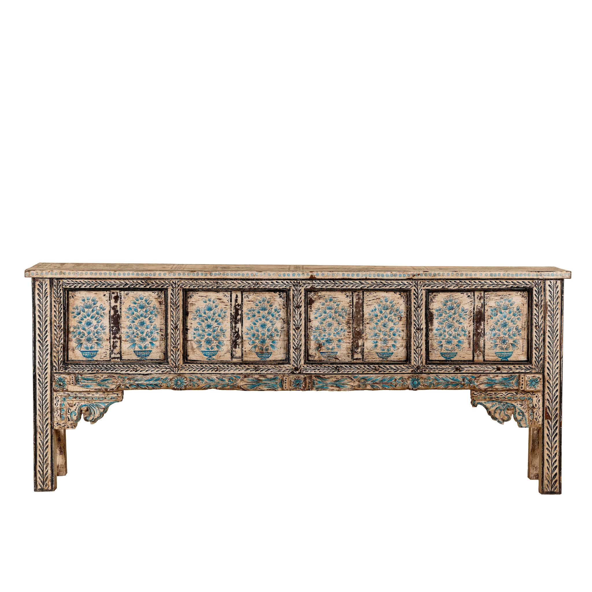 White background image of a hand painted console table in reclaimed teak with floral motifs and antique distressed finish, 197 × 40 × 82 cm.
