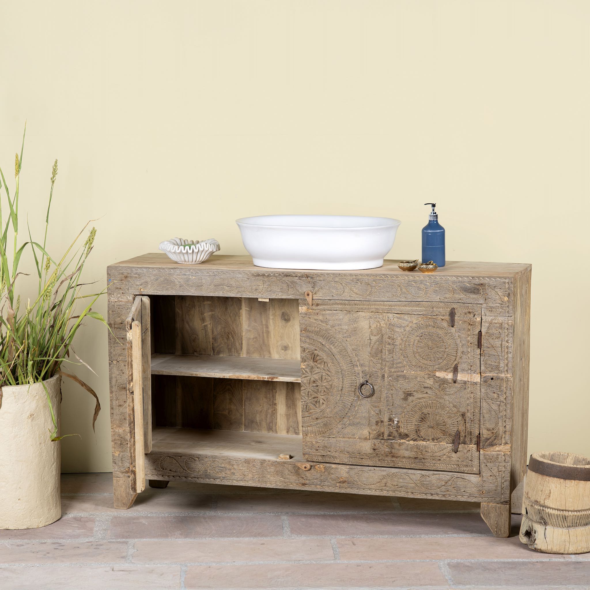 Open door image of a reclaimed wood sideboard made from antique teak doors with carved detailing; teak furniture, 134 × 37 × 82 cm.