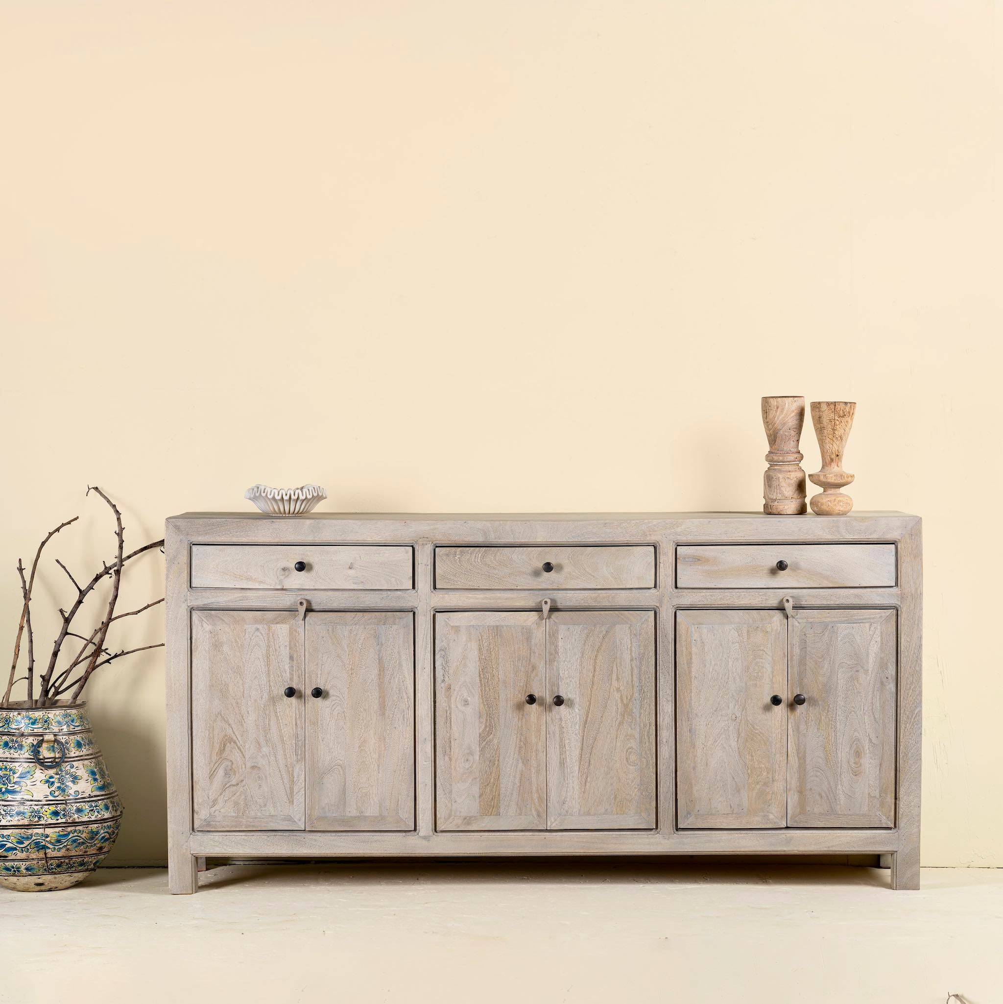 Sandblasted mango wood sideboard with 3 drawers and 4 cabinet doors; Mediterranean-inspired mango wood furniture, 180 × 40 × 90 cm.