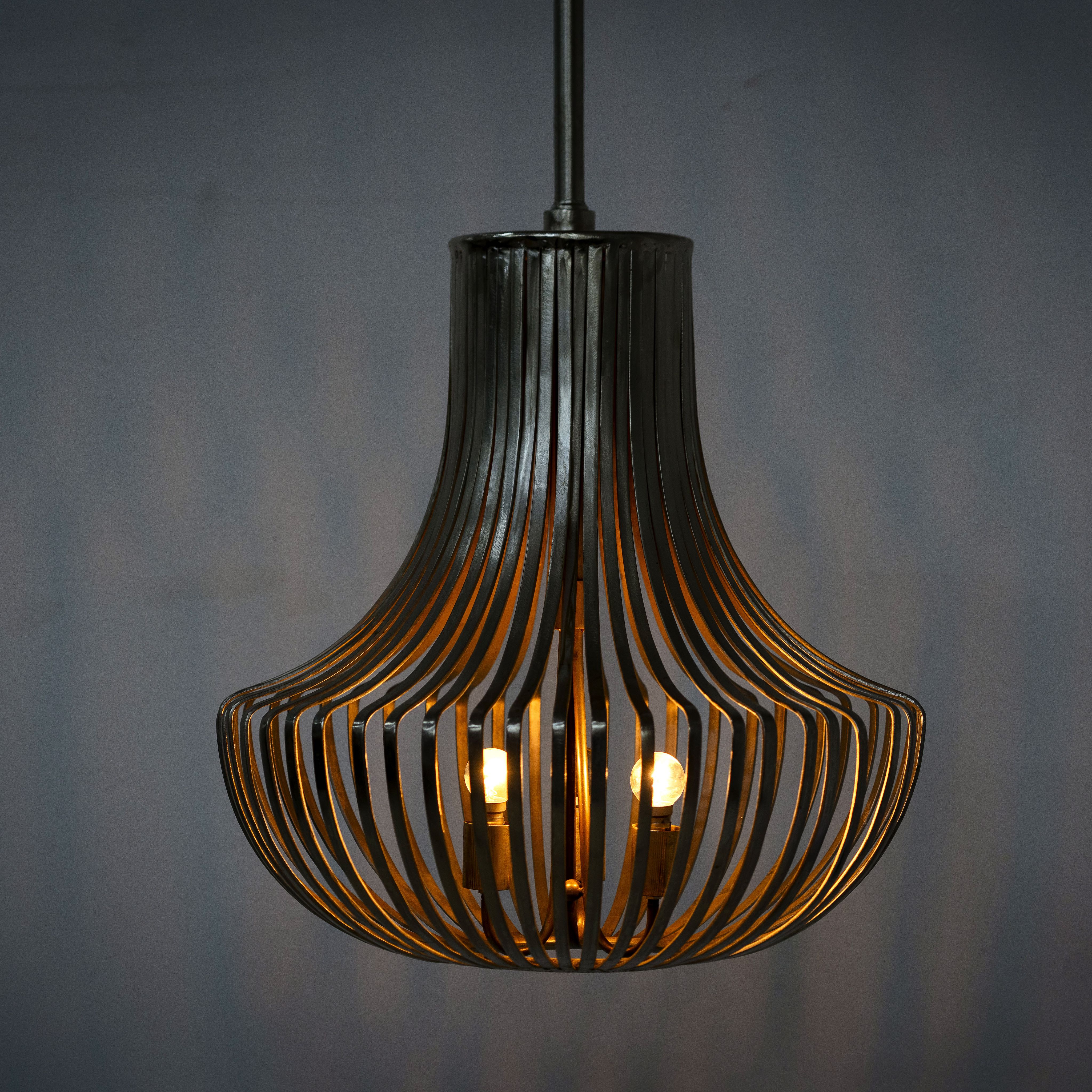 Lighted version of a large nickel-plated iron frame pendant light with pot-shaped silhouette – rustic style lighting ideal for kitchens, dining areas, and modern interiors.