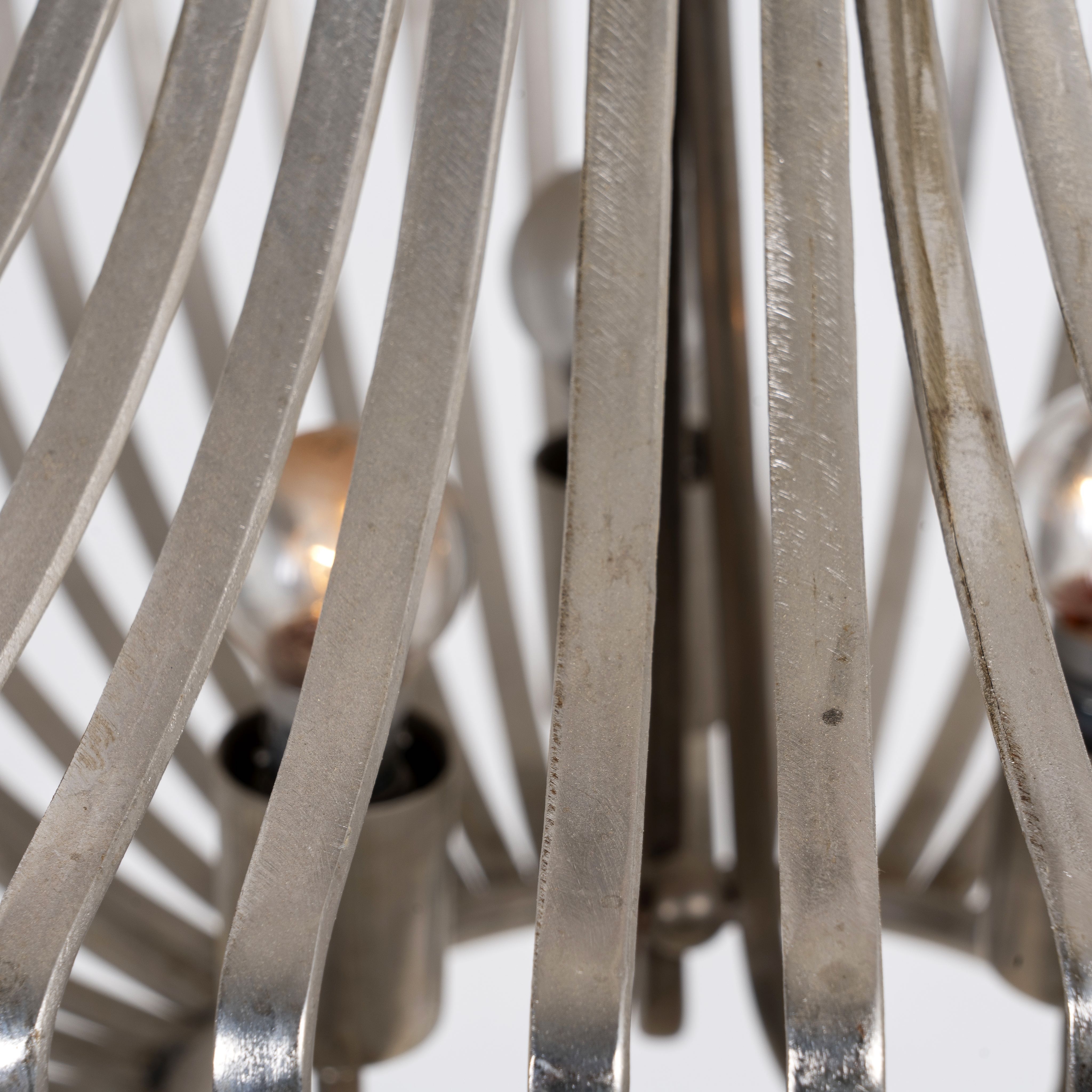 Close up image of a large nickel-plated iron frame pendant light with pot-shaped silhouette – rustic style lighting ideal for kitchens, dining areas, and modern interiors.
