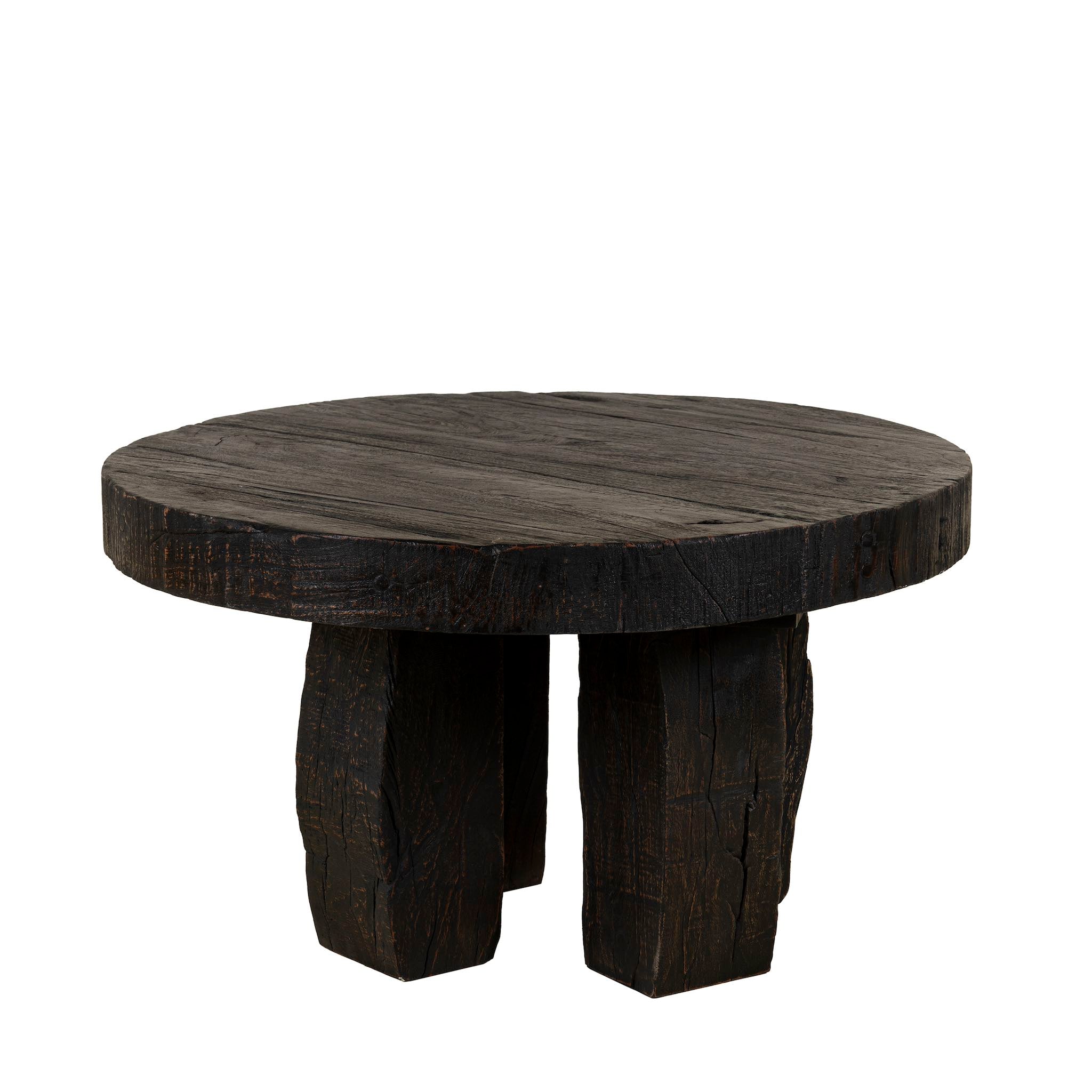 White background picture of a rustic wood coffee table with round reclaimed teak top and black charred finish; sustainable furniture, 70 cm diameter, 40 cm height.