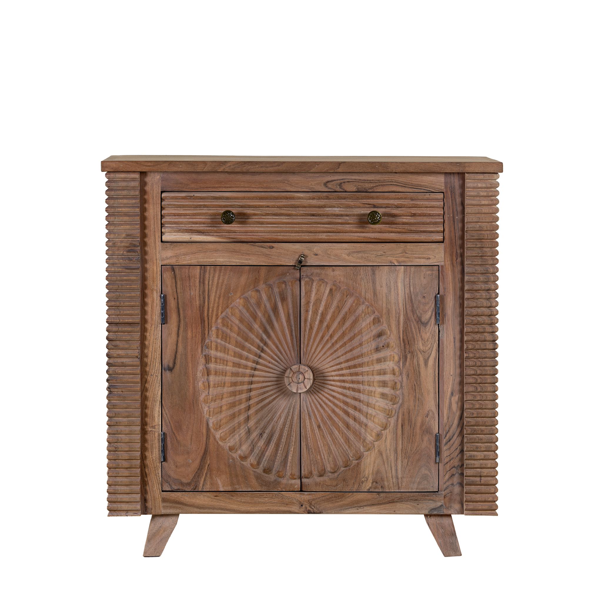 White background picture of a acacia wood cabinet with hand-carved sunburst doors, grooved details, and one drawer, 90 × 40 × 90 cm.