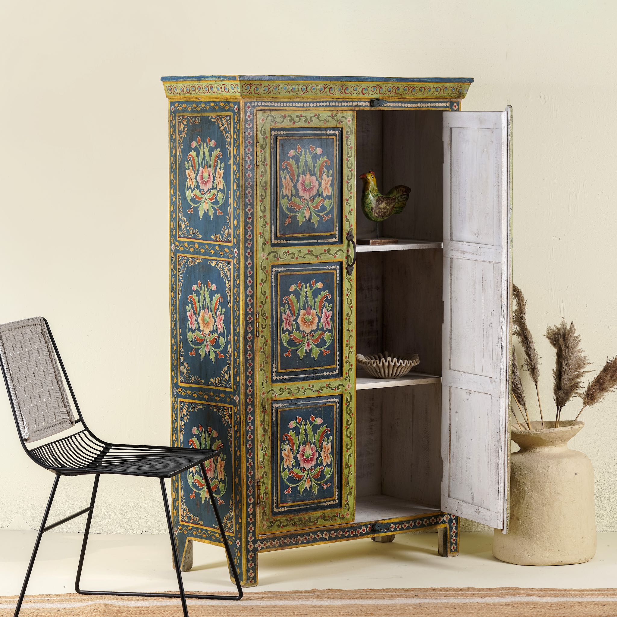 Open door image of a hand painted wardrobe made of reclaimed wood with floral motifs; unique furniture for bedrooms or living rooms, 90 × 45 × 150 cm.