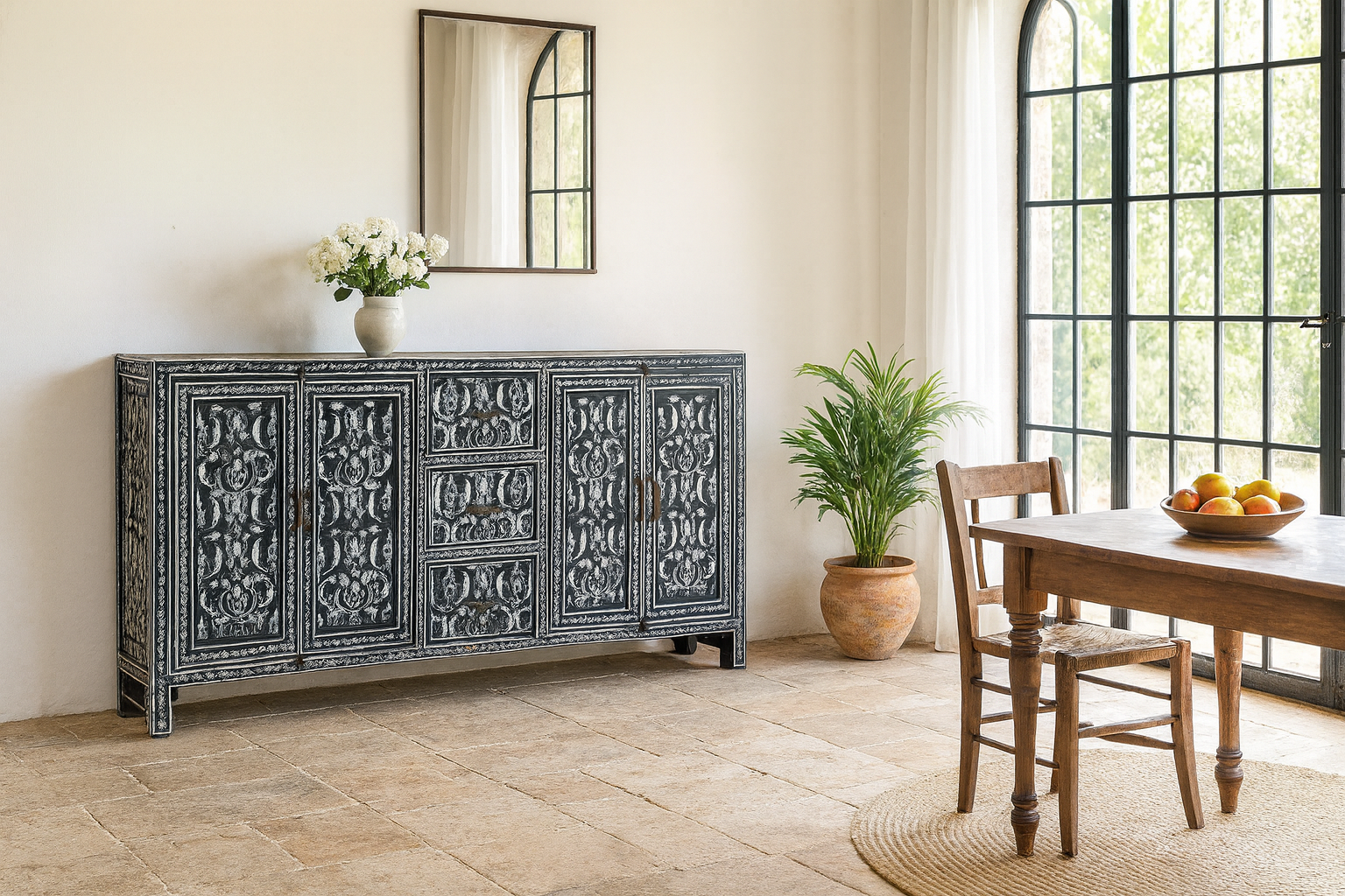 Lifestyle imagination of a hand-painted black and white sideboard made of reclaimed wood – Kaira model by Om Home & Garden