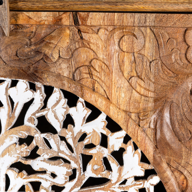 Close up image of a artisanal Tree of Life furniture wardrobe with whitewashed carvings, handcrafted mango wood with four storage compartments, 90 × 40 × 180 cm.