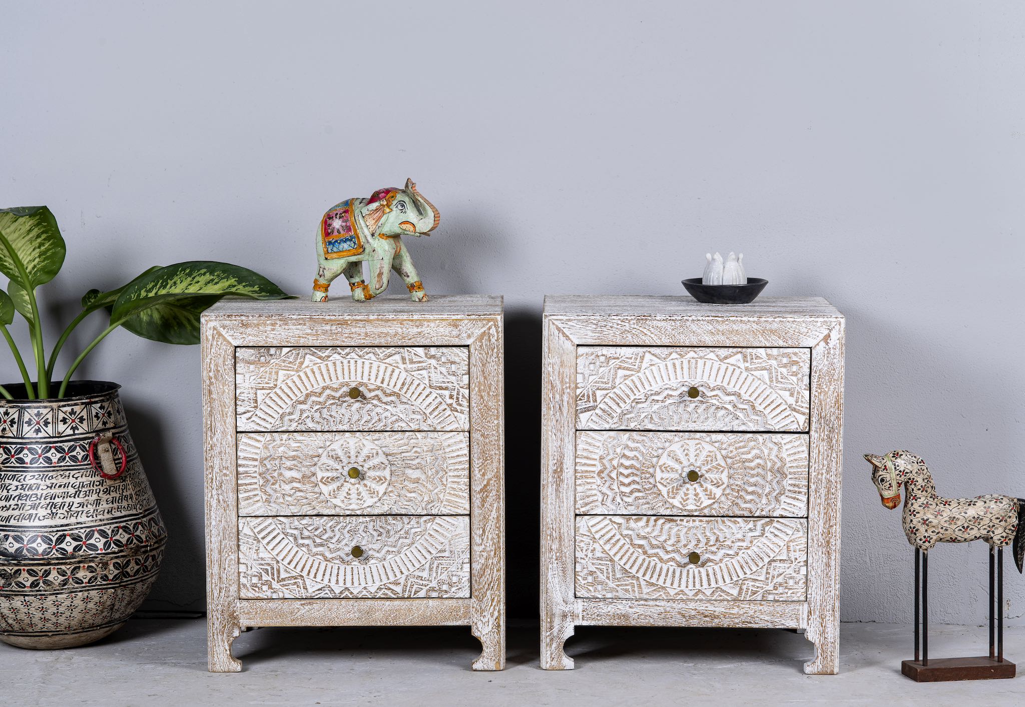Set of two hand carved night stands in solid mango wood with mandala motifs; white washed furniture, 50 × 40 × 60 cm.