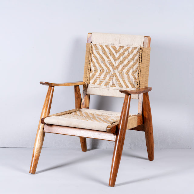 Side angle image of an acacia wood chair with handwoven cotton rope seat and backrest, artisanal wooden armchair, 61 × 47 × 83 cm.