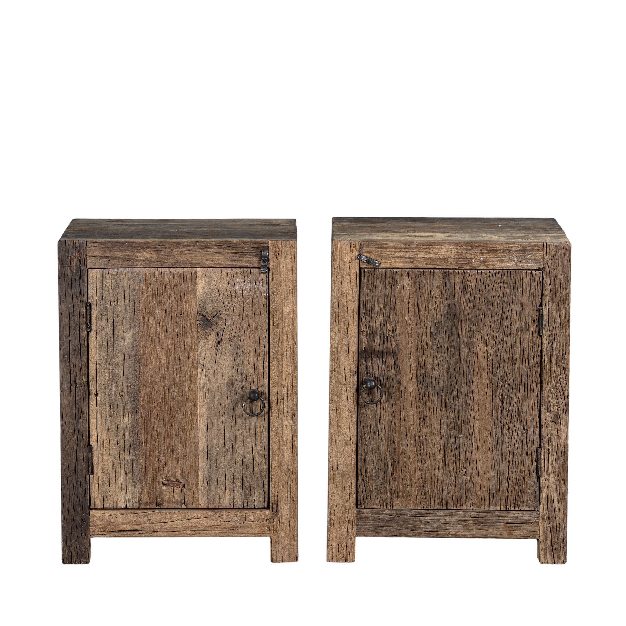 White background photo of a reclaimed wood bedside table with single cabinet door – handcrafted driftwood furniture ideal for rustic minimalism and natural interior styling.