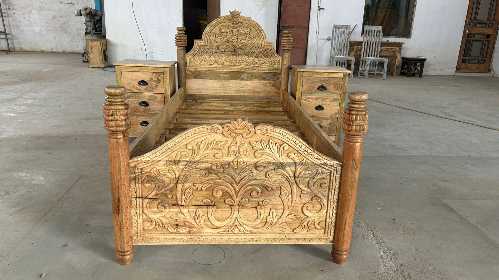 Wooden carved single bed made of mango wood.