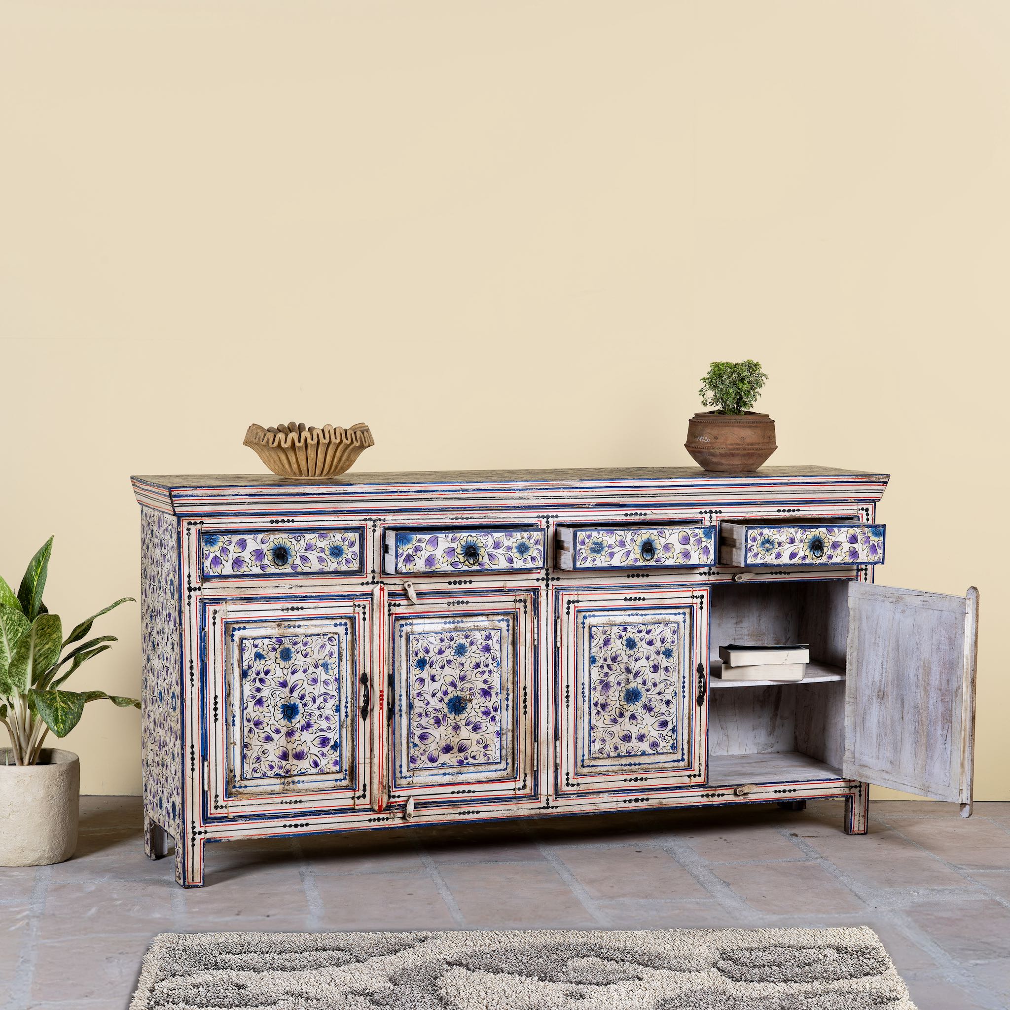 Open door image of a hand painted wooden furniture sideboard with floral motifs, unique furniture piece made from reclaimed wood, 180 × 40 × 90 cm.