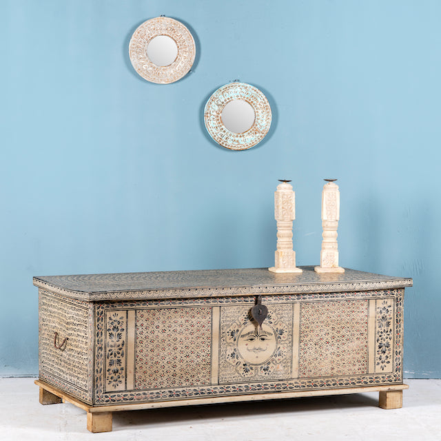 Side angle image of a hand-painted reclaimed wood chest box with Indian motifs – vintage home decor and versatile storage with coffee table function.