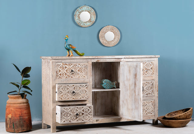 Open door and drawer image of a hand-carved wood carved sideboard in mango wood furniture style with vintage three-layer finish.
