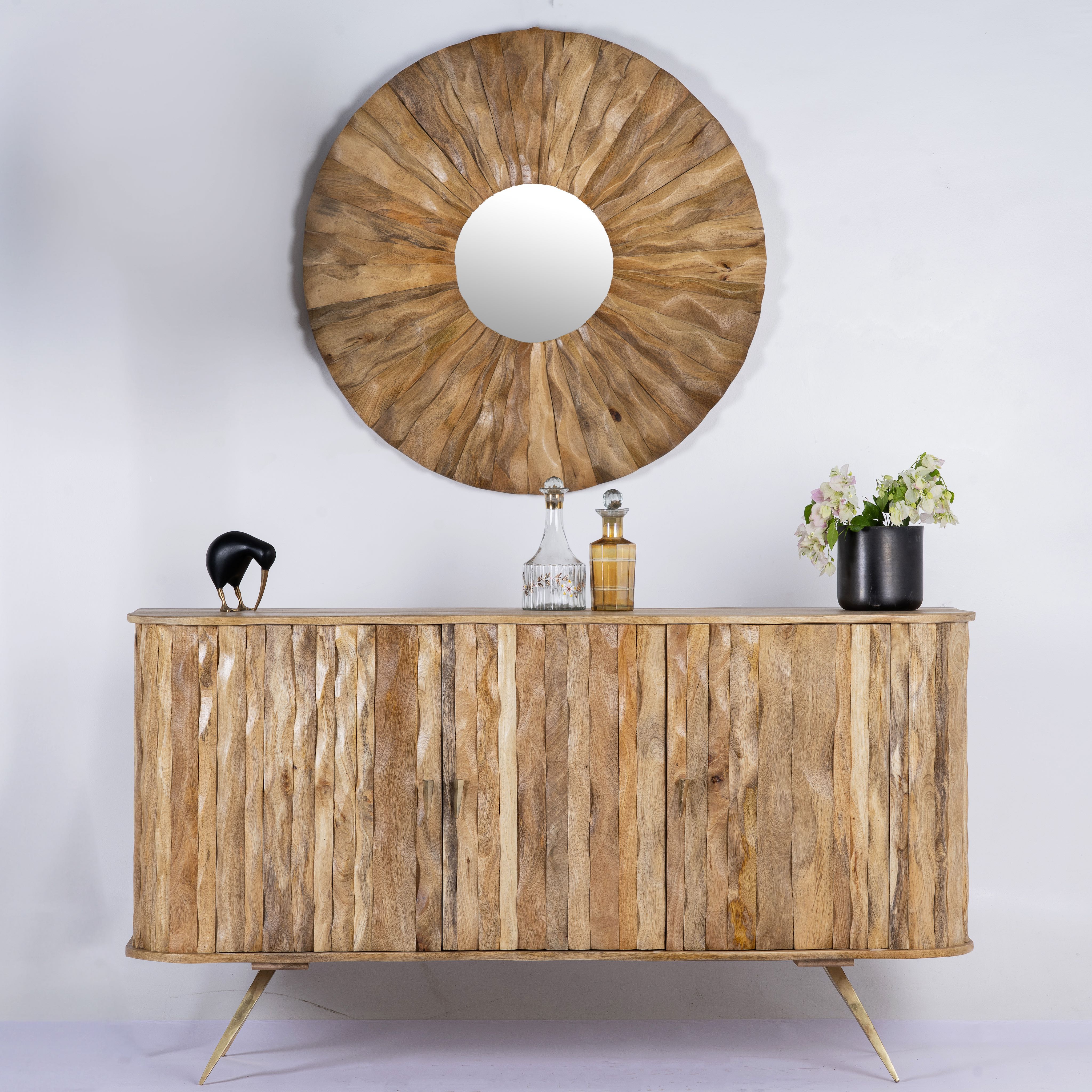 Handmade mango wood sideboard with live-edge design, brass-coated base, and handles—an artisanal furniture piece combining natural and modern elements.