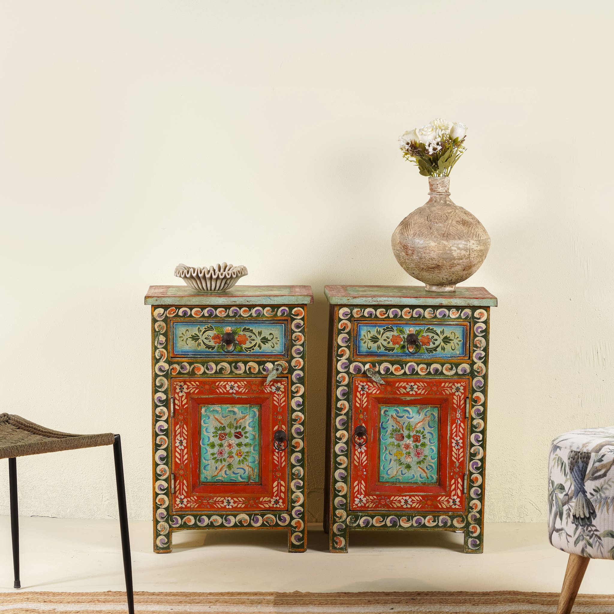 Hand-painted bedside tables made from recycled wood – vintage night stands with carved mango wood furniture detailing and floral artistry.