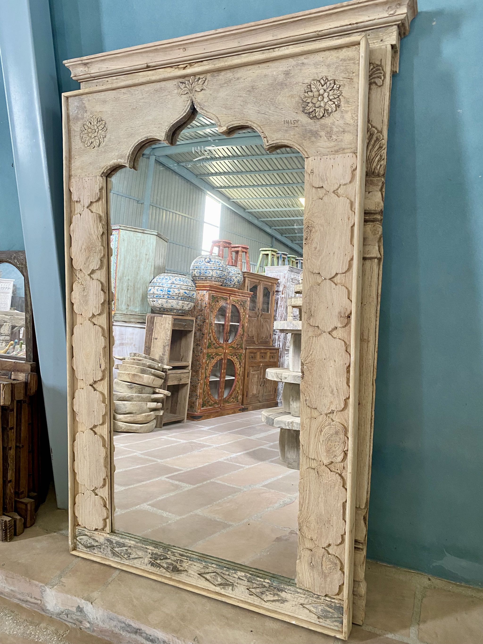Tall wall mirror crafted from reclaimed teak wood with minimalist arch design, part of vintage home accessories and ideal for complementing living room furniture in coastal or Mediterranean interiors.