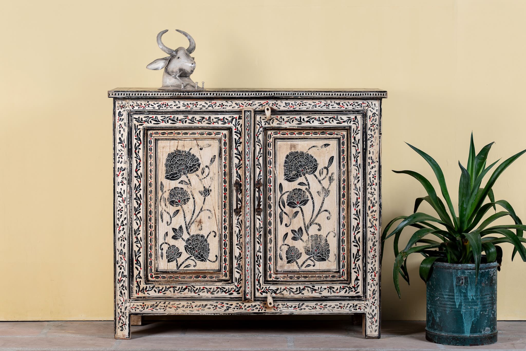 Hand-painted cupboard made from reclaimed wood with Indian floral motifs; ideal for boho chic living room or unique furniture decor, 100 × 92 × 36 cm.