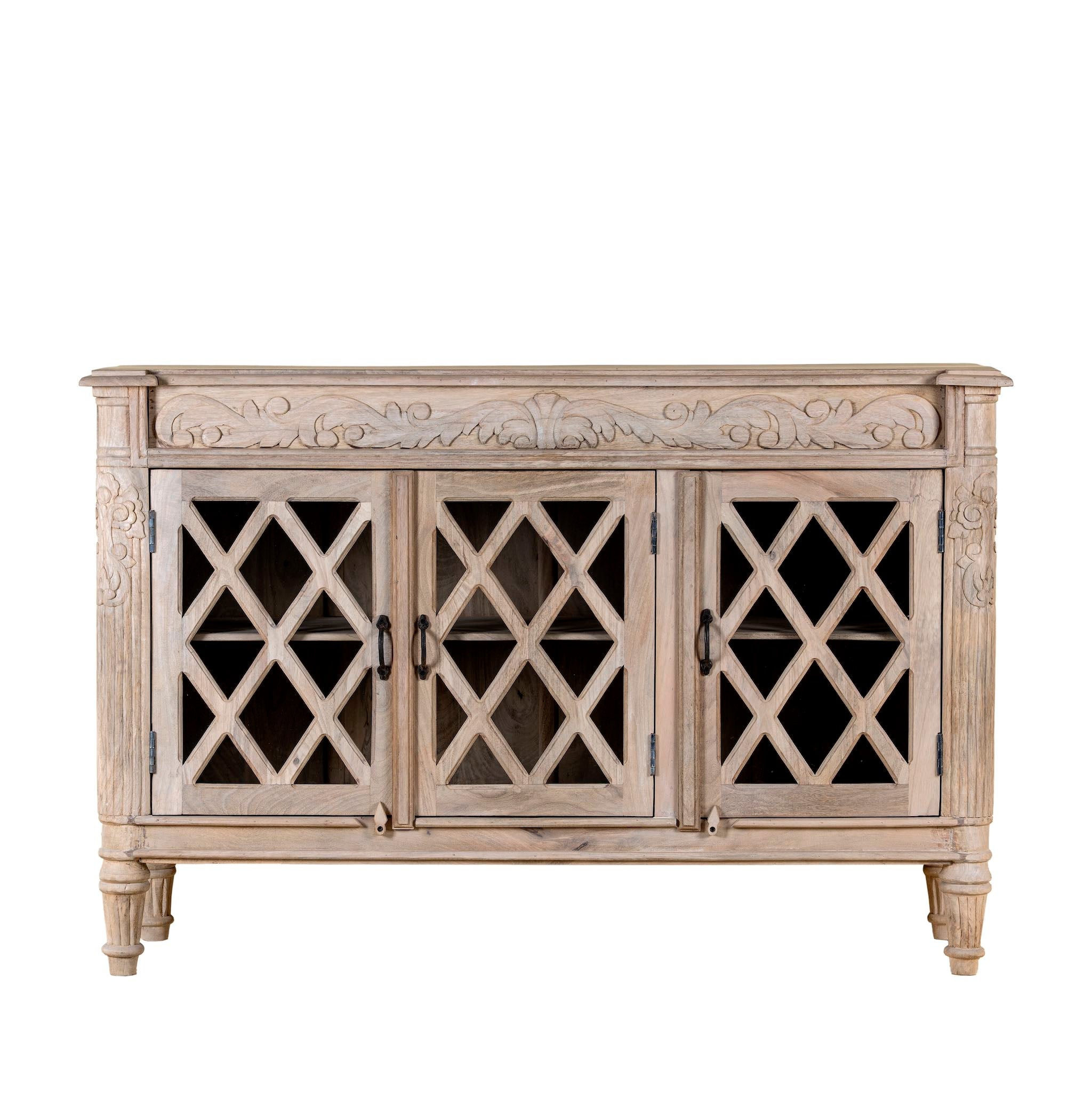 Rustic sideboard made of Mango wood with hand-carved details and glass panelled doors featuring a diamond lattice design.