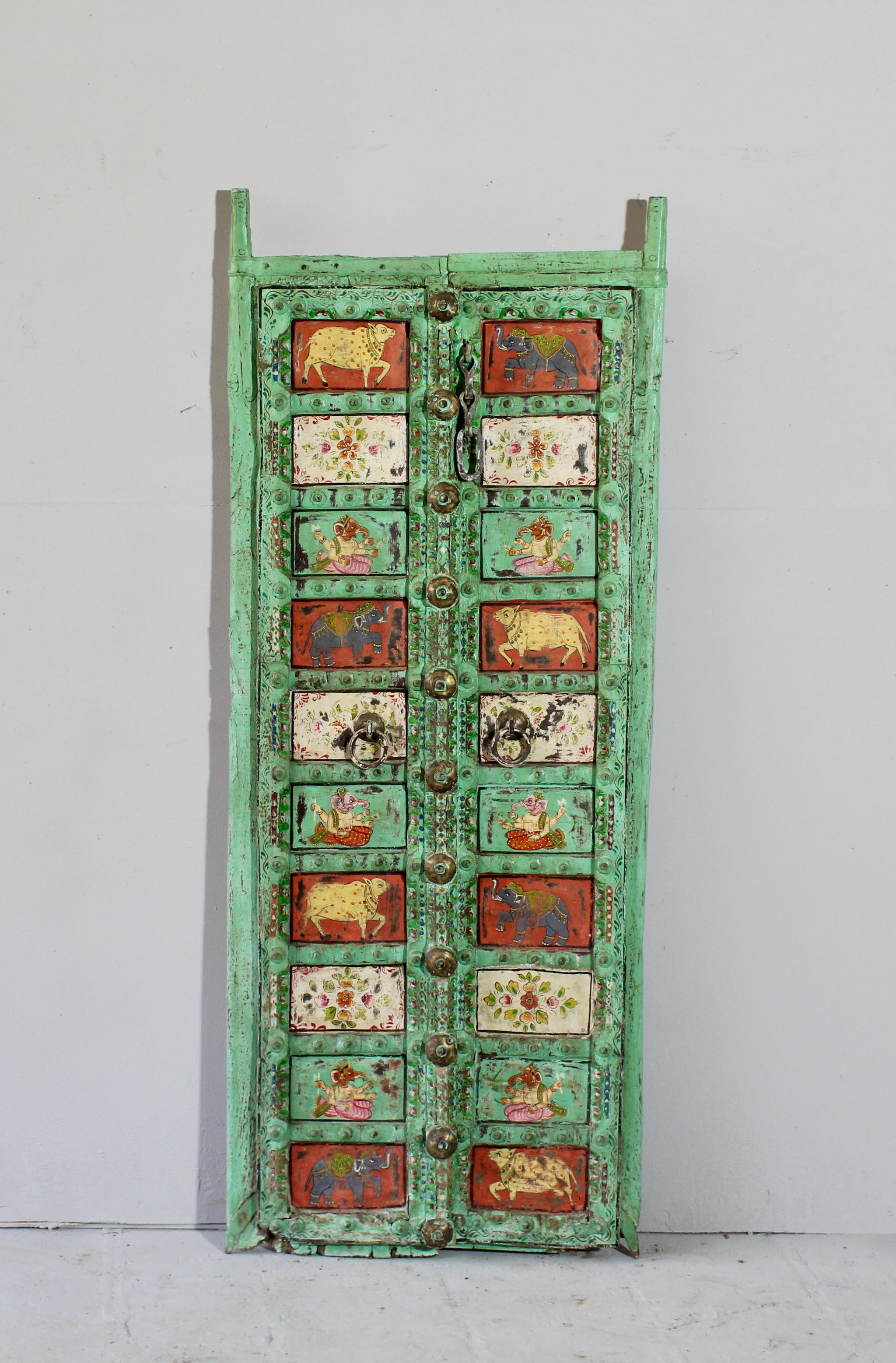 Tarak hand-painted teak door panel with sacred and floral motifs in a distressed teal frame—a one-of-a-kind example of teak door panels and unique Indian wall decoration.