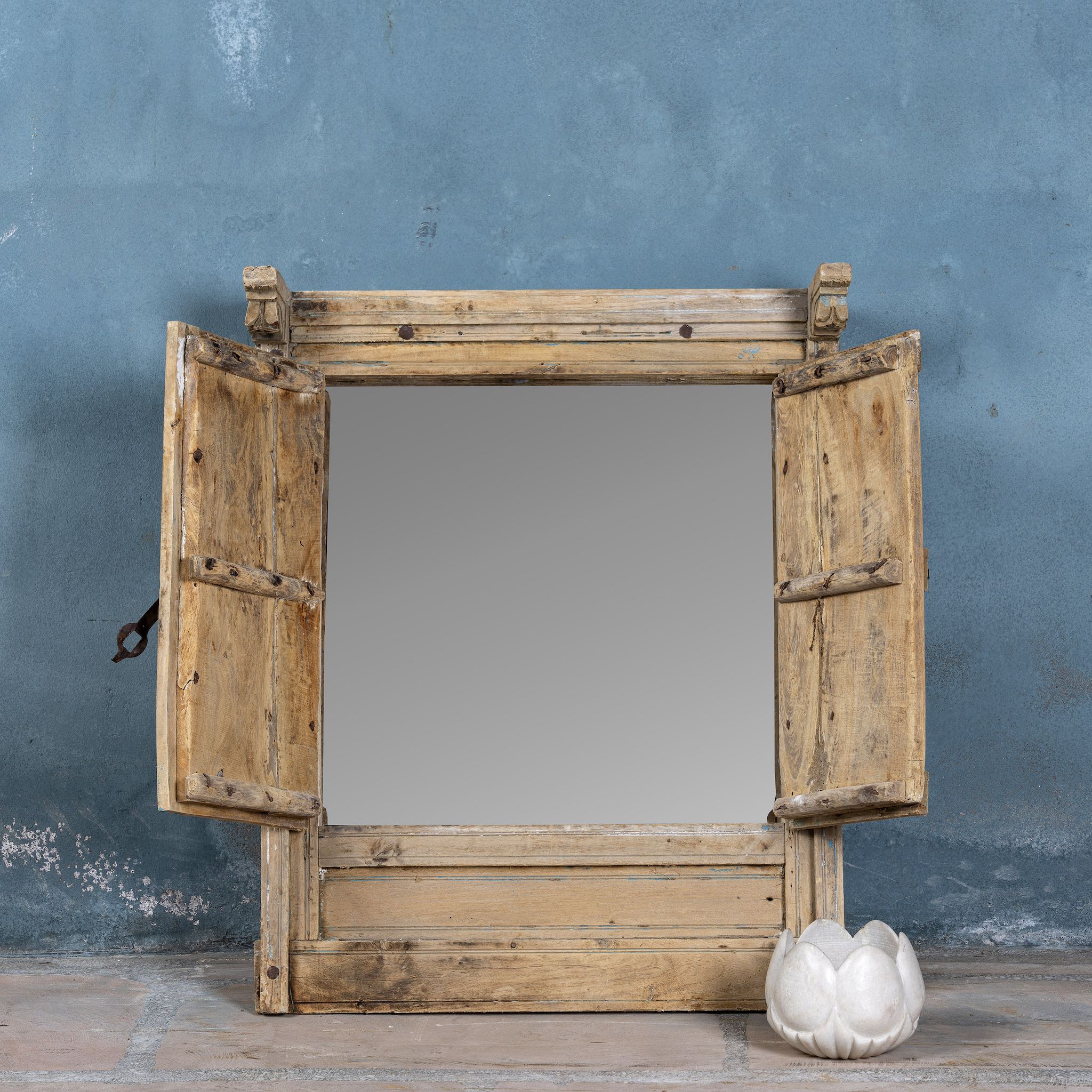 Open shutter image of an antique Indian teak window mirror with shutters, vintage wall panel style, part of our vintage home accessories collection.