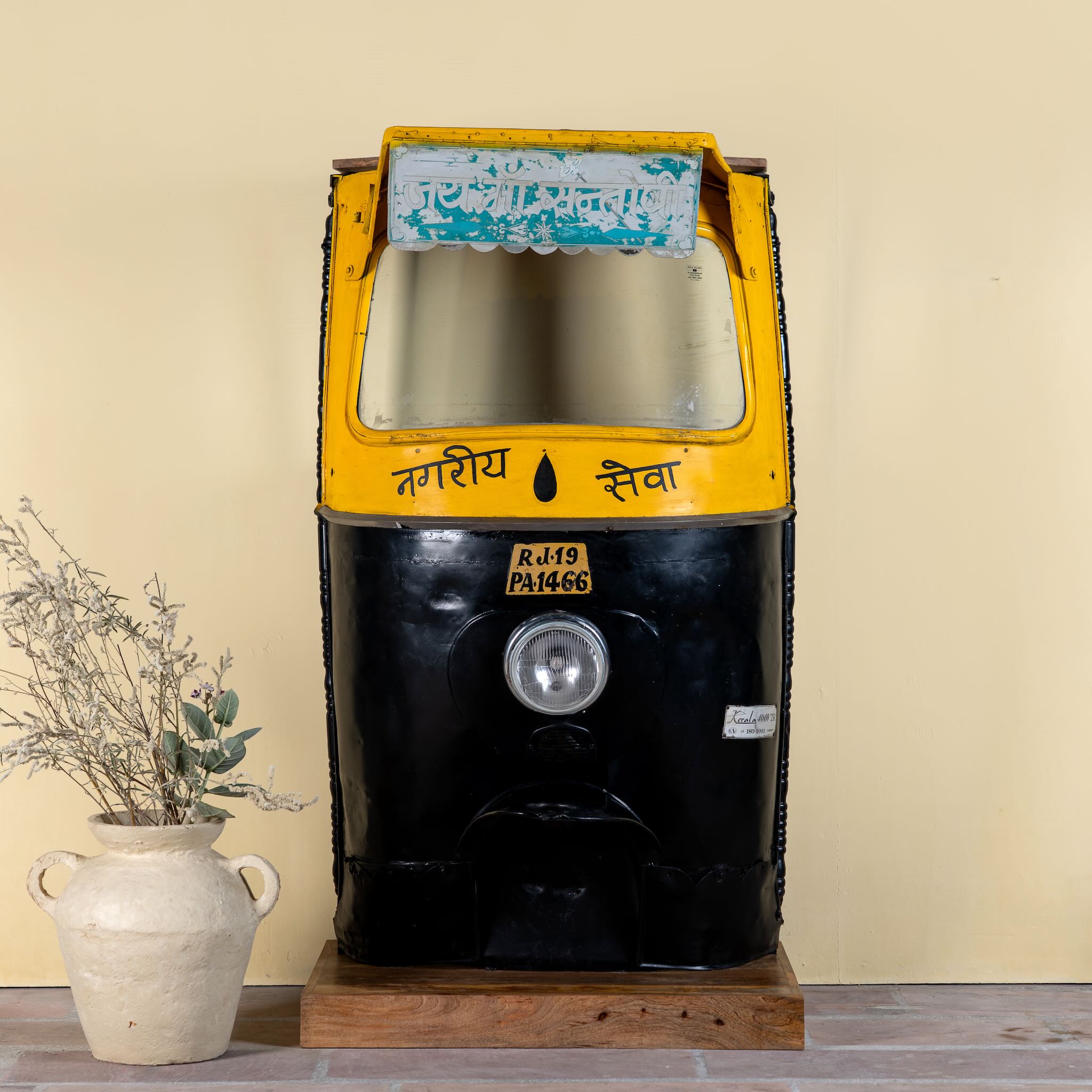 Artsy bar table made from a reclaimed Indian rickshaw front with working headlight – Zoha Riksha bar model by Om Home & Garden