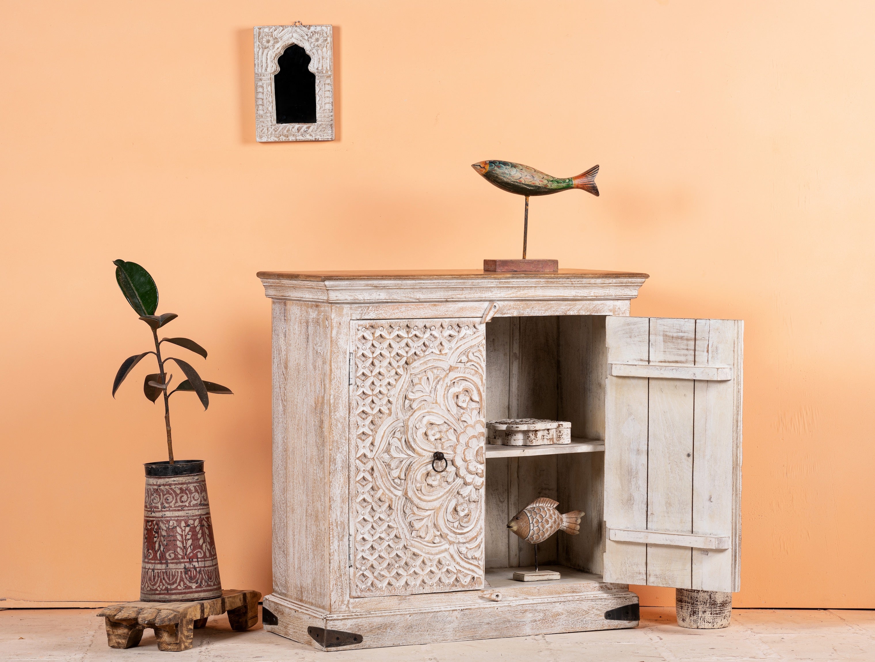 Open door image of a whitewashed mango wood sideboard with hand-carved floral patterns; compact carved sideboard for vintage interiors, 90 × 90 × 40 cm.