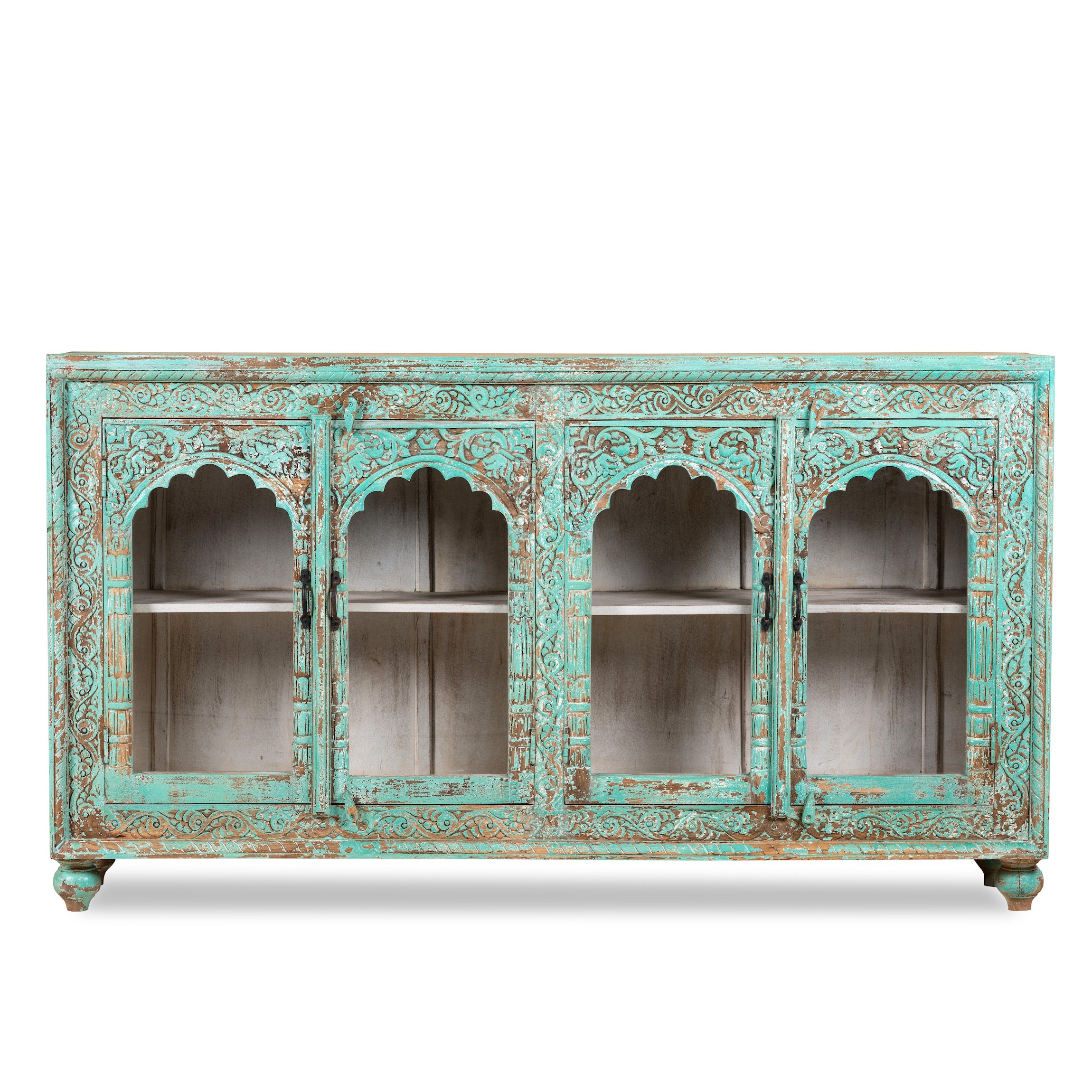 White background image of Jesar wood carved sideboard in turquoise finish, a vibrant statement for a boho chic living room.