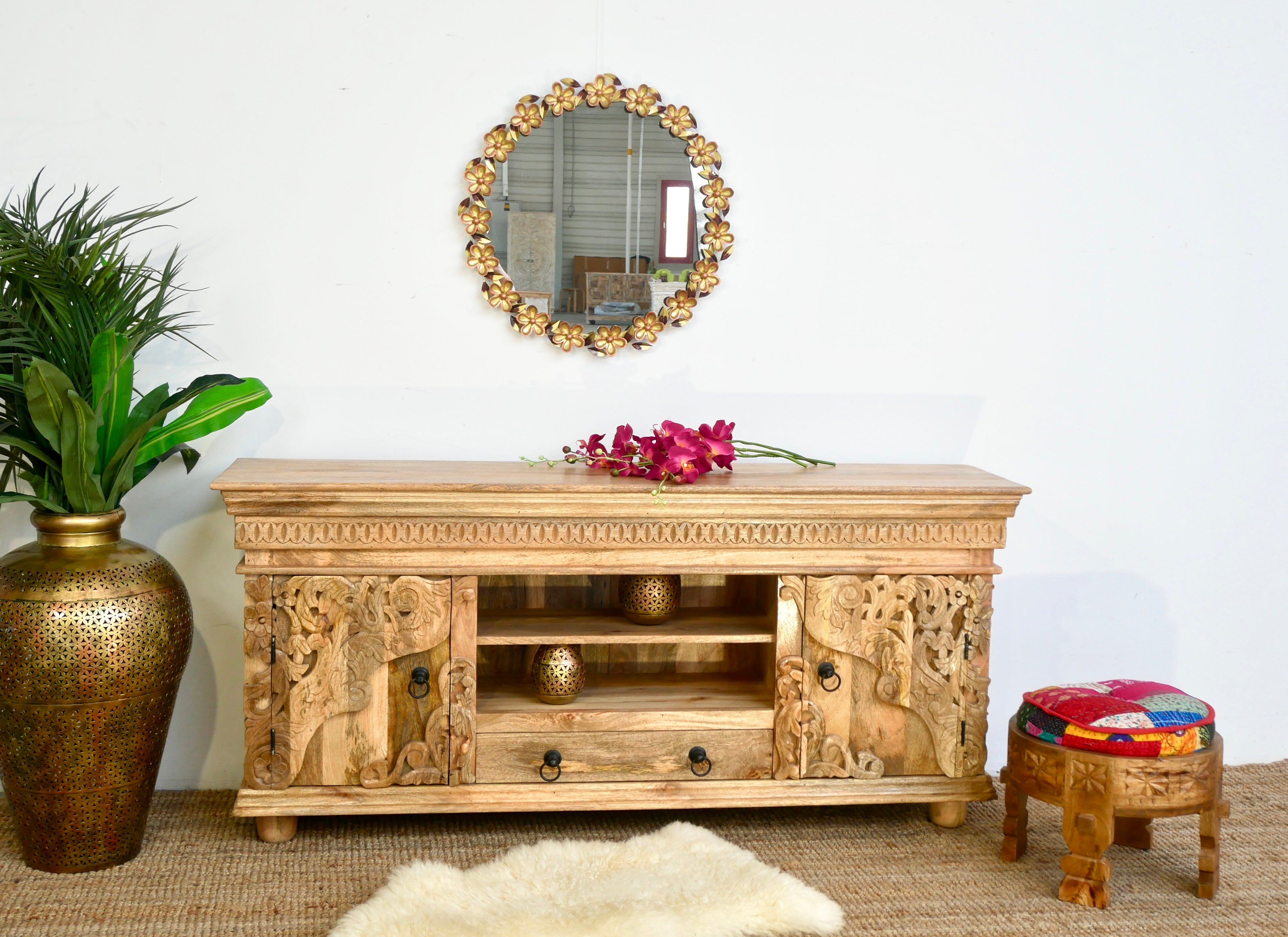 Hand-carved mango wood lowboard with two doors, one drawer, and open shelving; carved wooden sideboard for living or media room, 160 × 75 × 40 cm.
