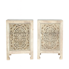 White background image of a pair of hand-carved nightstands made of sandblasted mango wood with floral Mediterranean patterns and two drawers – Aanya bedside tables by Om Home & Garden