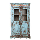 White background image of a reclaimed teak wood display cabinet with light blue shabby chic finish and ceramic inlays – sustainable teak wood showcase with glass doors.