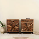 Driftwood cabinet with sunburst front pattern and iron legs, one drawer and cabinet; looks great as sink base cabinet or accent furniture, 63 × 40 × 73 cm.