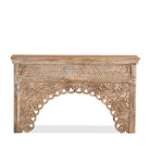 White background image of a vintage console table in mango wood with hand-carved floral and geometric patterns and arched detailing; carved console table, 150 × 90 × 40 cm.