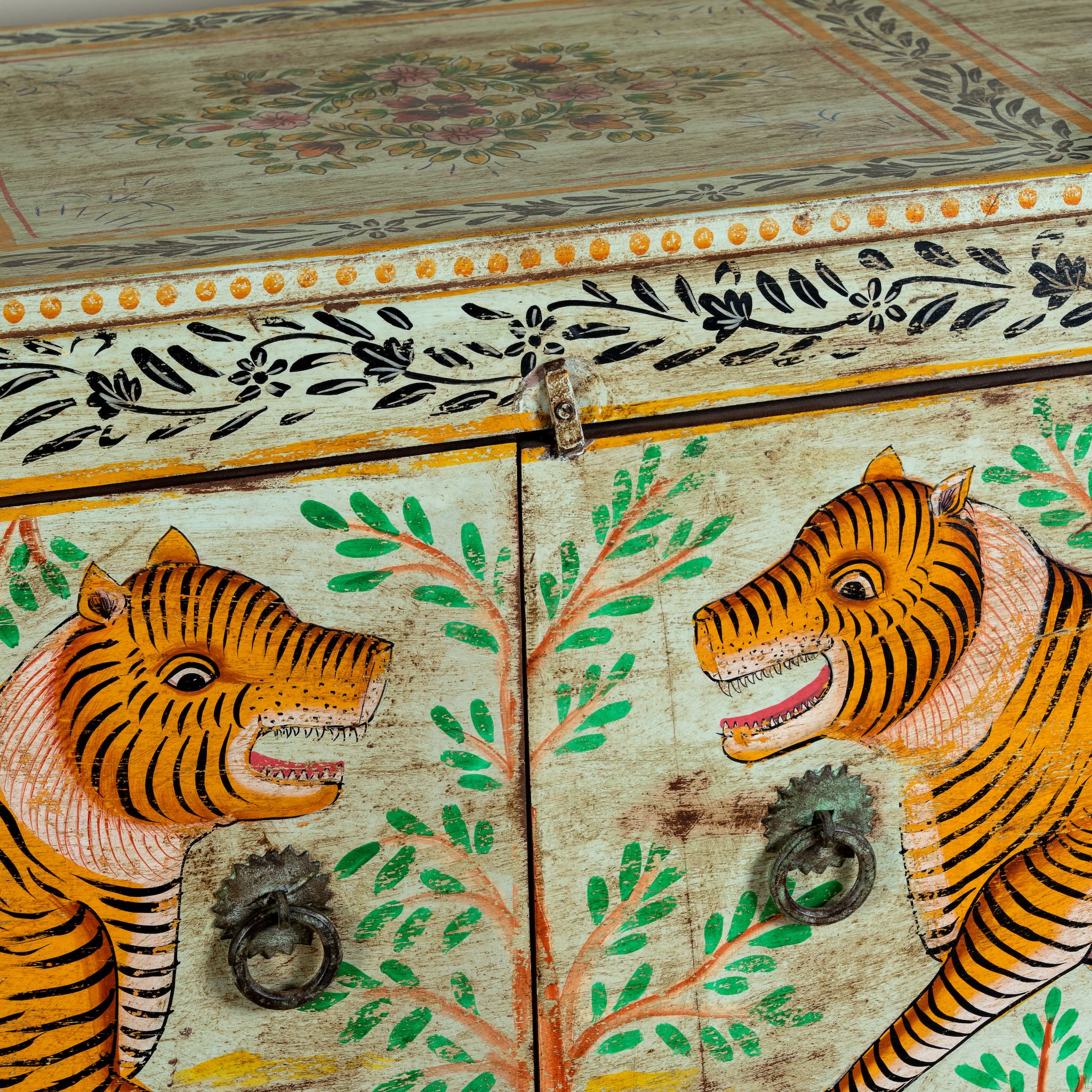 Close up image of a reclaimed wood console table Alina in a Boho Tiger design, featuring hand-painted tigers and floral details. A bold piece of artisanal furniture perfect for colourful and eclectic bohemian interiors.