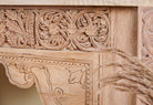 Close up image of a antique teak console table made from reclaimed wood with hand-carved floral and geometric panels, 183 × 40 × 82 cm.