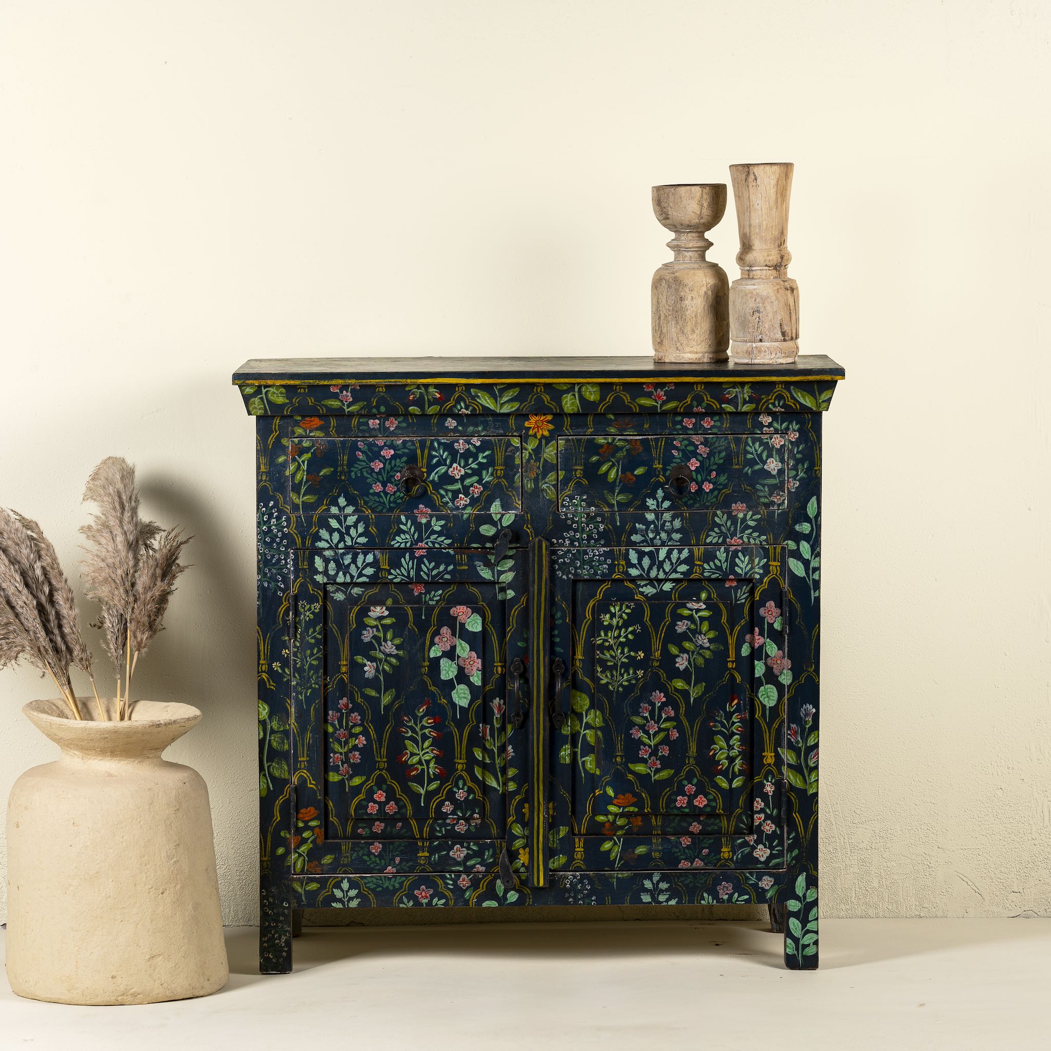 Hand painted cupboard made from recycled wood with floral motifs, two drawers and two doors, 90 × 90 × 40 cm.