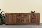 Reclaimed wood lowboard Ariana in rustic minimalistic style with four cabinets and two drawers. A sustainable furniture piece offering functional storage and natural texture for modern living spaces.