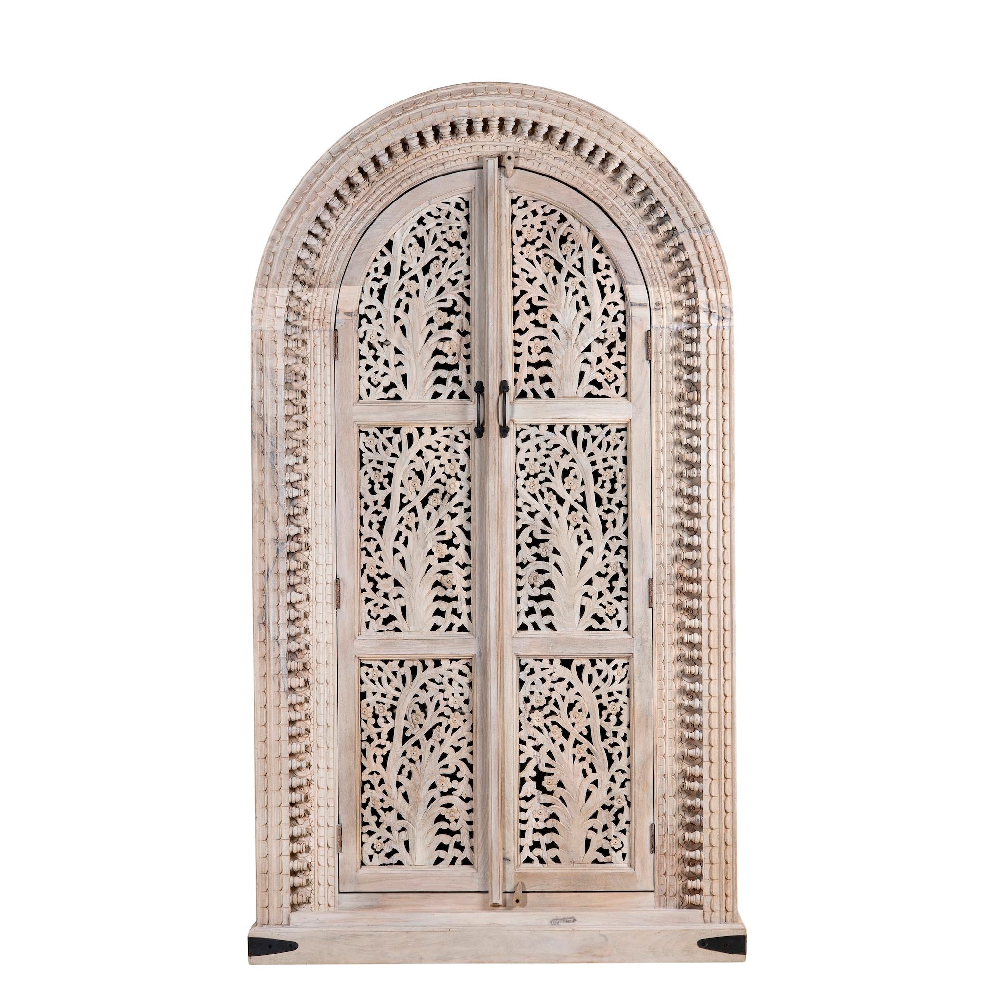White background picture of Artha cabinet with Tree of Life carving, a unique furniture piece from our mango wood furniture collection.