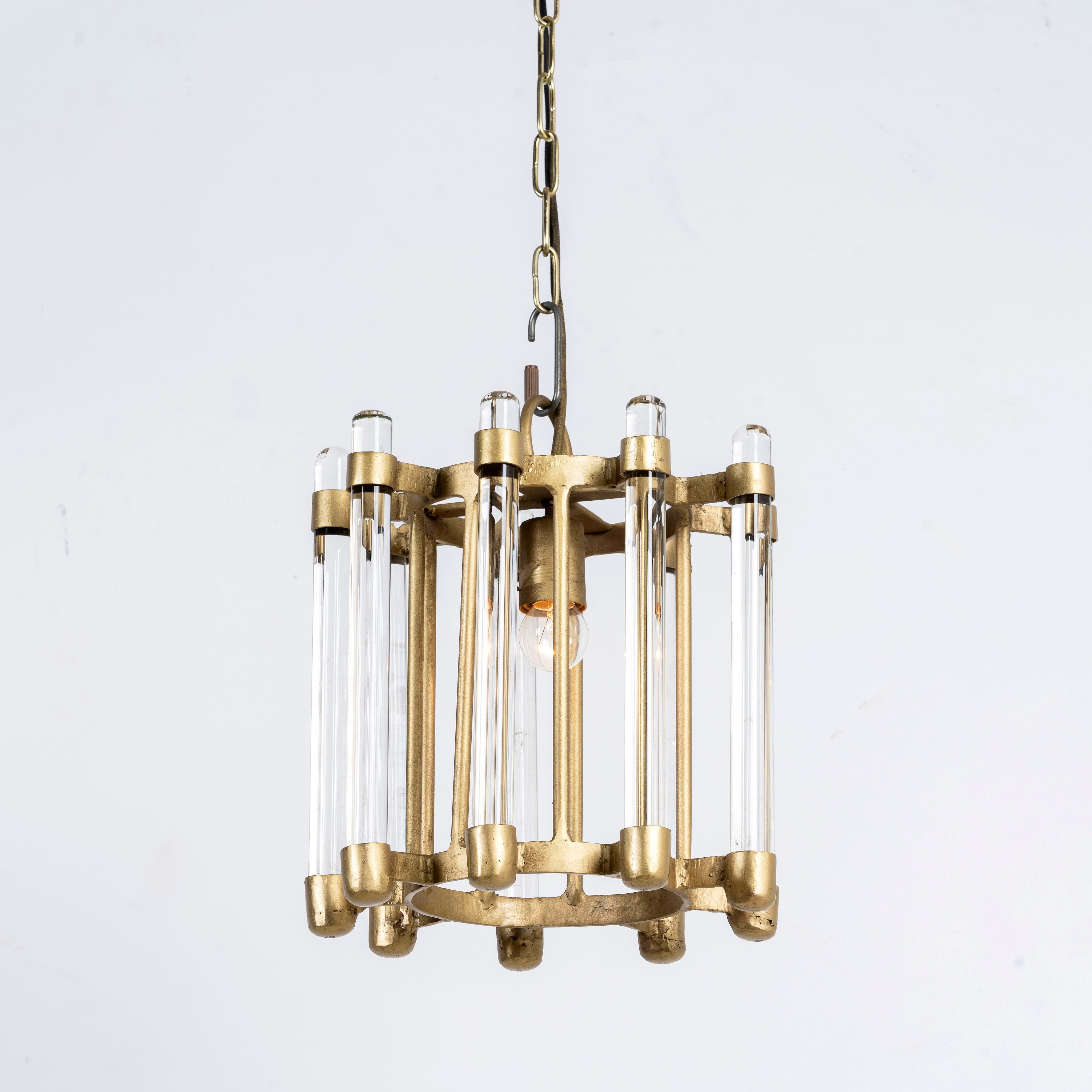 Round antique brass iron and glass pendant light with test tube shade – minimalistic pendant light ideal for soft glass lighting in bedrooms, kitchens, or entryways.