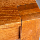 Close up image of a rectangular solid wood dining table crafted from reclaimed teak; minimalist style reclaimed wood dining table, 180 × 100 × 77 cm.