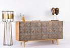Avighna sideboard styled in a contemporary interior with brass accents