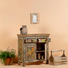 Open door image of a sustainable hand painted wooden cabinet with Mediterranean floral design, made from recycled wood, 90 × 90 × 40 cm.