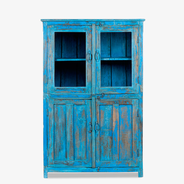 White background image of a refurbished blue teak wood showcase with glass and wooden doors – sustainable dining room furniture crafted from reclaimed teak with vintage flair.
